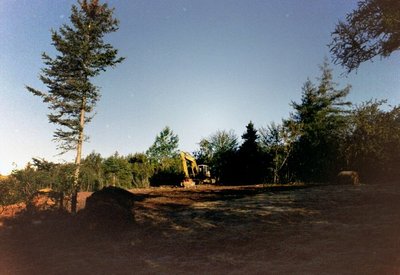 canada, picture 7: the house is going somewhere near where the bulldozer is. click on the image to go to the next picture