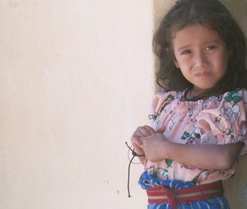 guatemala, picture 1: girl, san pedro. click on the image to go to the next picture