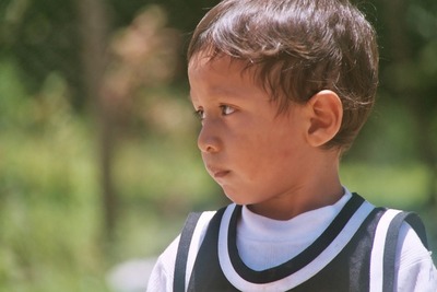 guatemala, picture 13: boy, san pedro. click on the image to go to the next picture