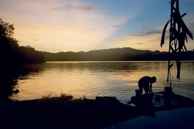 guatemala, picture 33: pre-sunrise washing, ak' tenamit. click on the image to go to the next picture