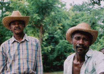 haitians, picture 1: two men. click on the image to go to the next picture