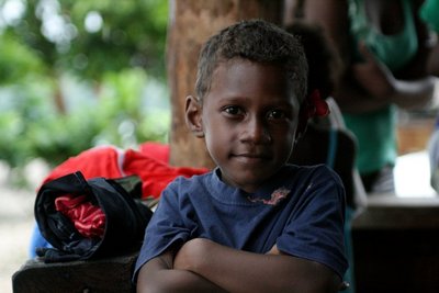 september, picture 2: boy, beach near white river. click on the image to go to the next picture